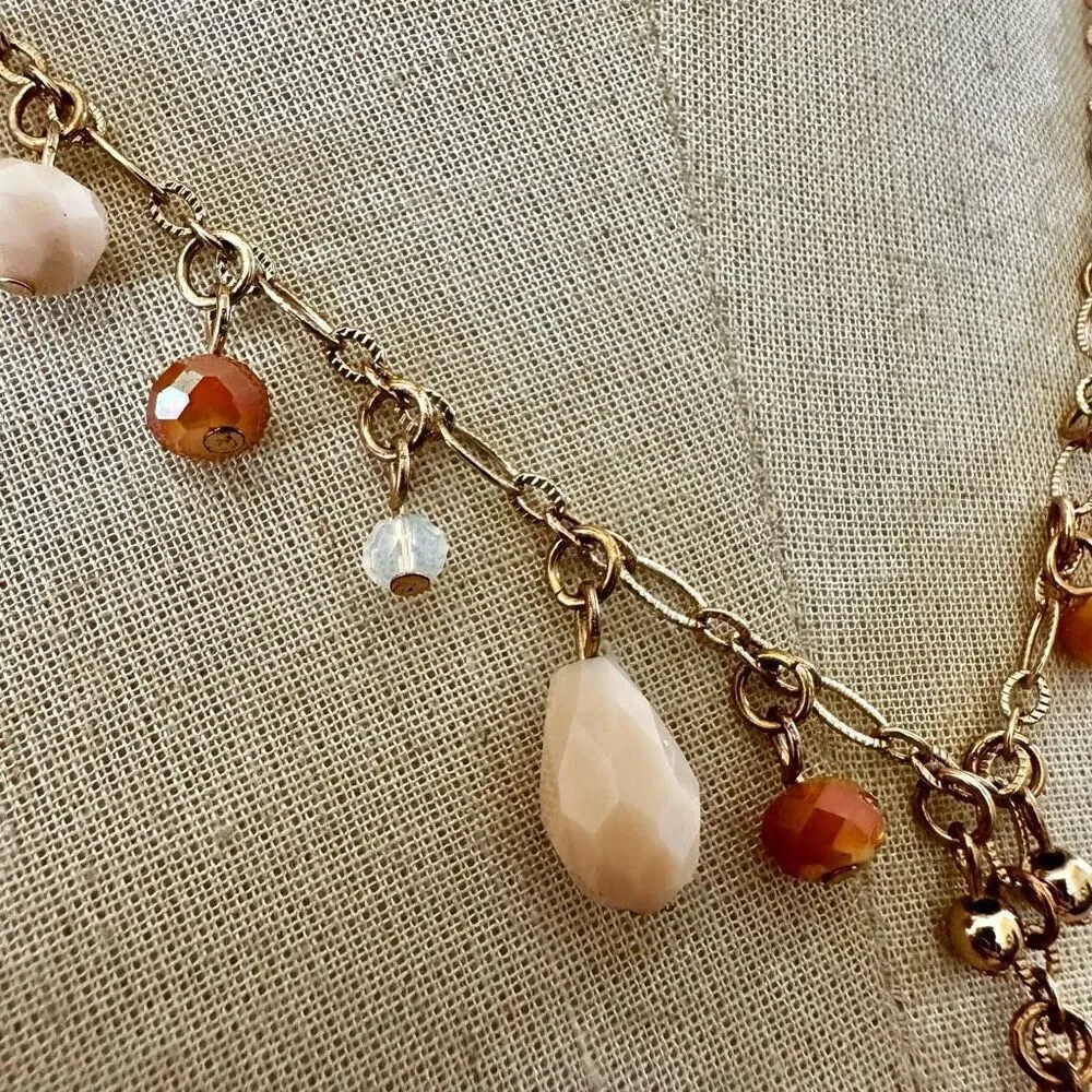 AA  gold tone long beaded Y necklace